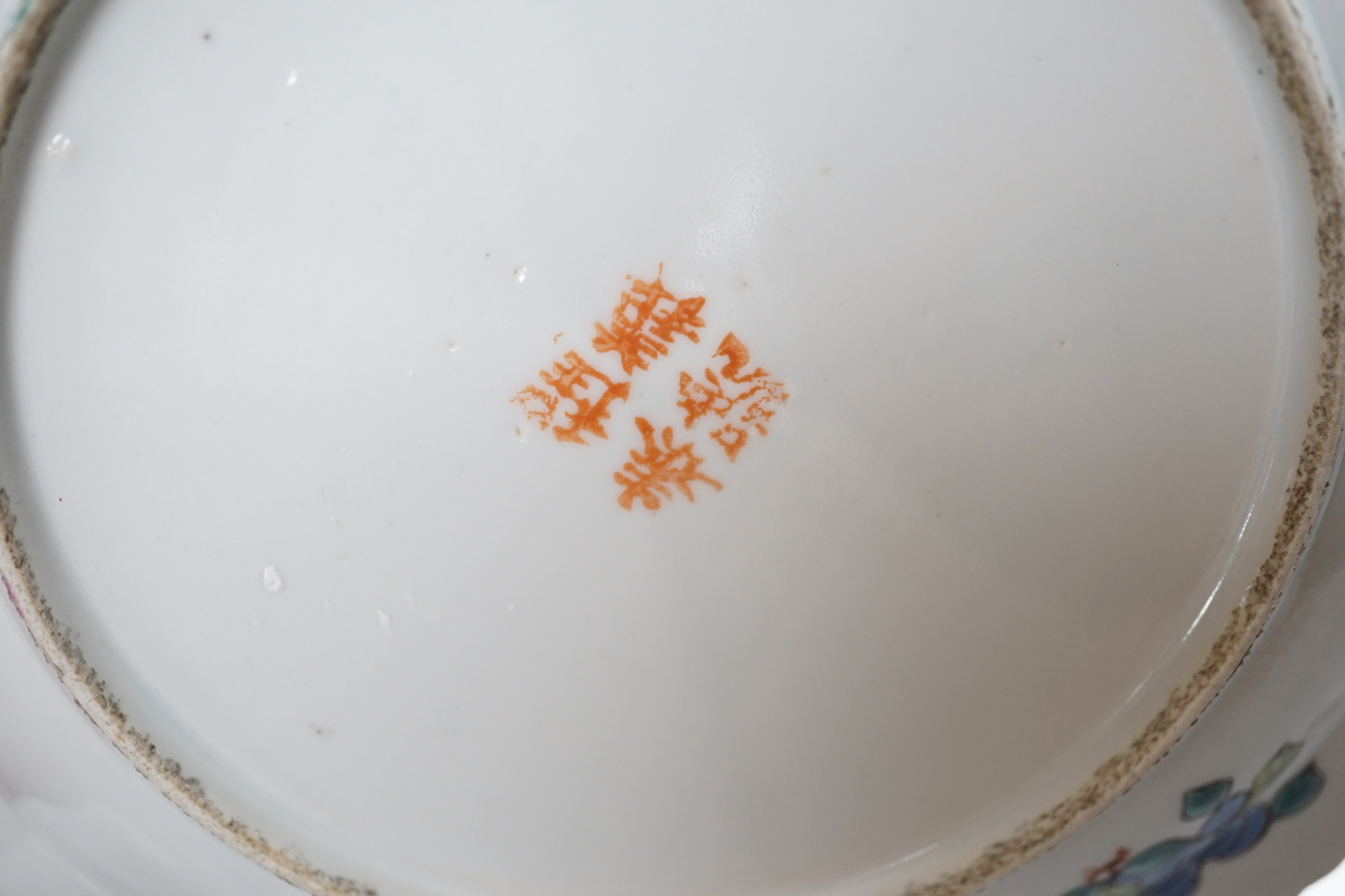 A pair of Chinese Straits famille rose plates for the Malaysian market, 23cm diameter